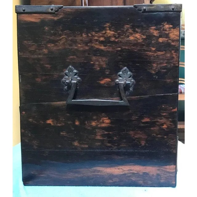 A 19th century macassar ebony english brassbound gothic influence two drawer cigar/ jewelry casket with two carrying...