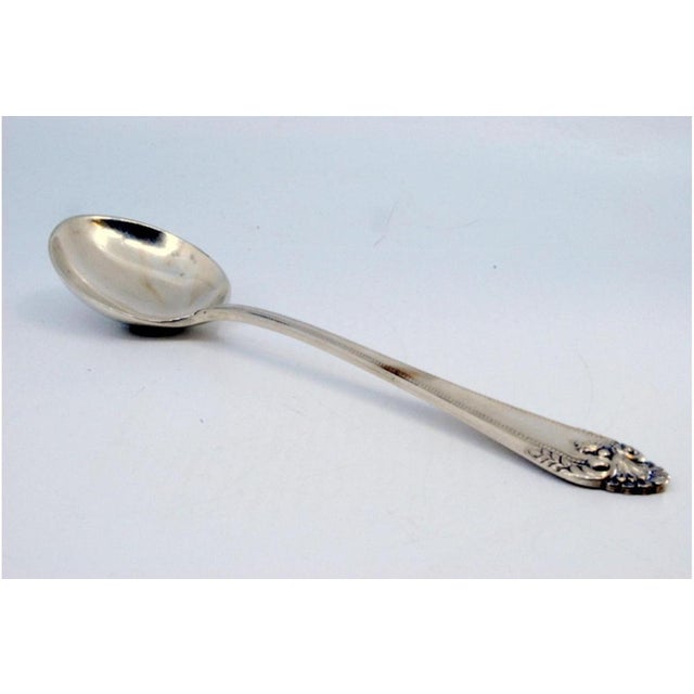 Silver Rice and Serving Spoon with Grooves, in Very Good conditions. Designed 1920 to 1949 This piece has an attribution...