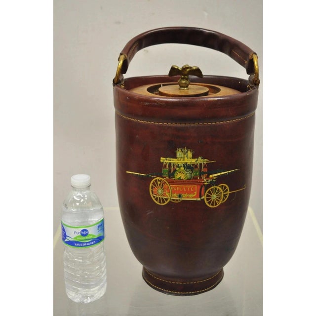 Vintage Loyal Papeete Firetruck Brown Leather Brass Eagle Handle Bar Ice Bucket. Item features a leather wrapped frame,...