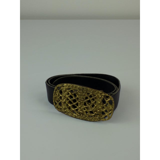 This bronze-worked belt is attributed to the artist Line Vautrin This piece is attributed to the mentioned designer/maker....