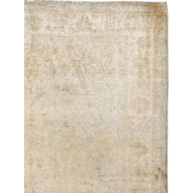 This Mid-20th century Turkish Sivas rug, measuring 4' 0" x 5' 8", is a graceful example of the region’s celebrated weaving...