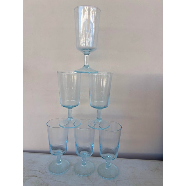 Vintage Aqua blue Bowl & Stem Wine Goblets. The glass has a light tint blue with a Square Bowl and Sunburst Star Base....