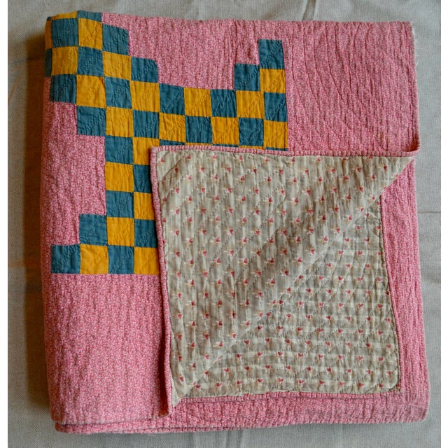 This is a wonderful early 20th-century meticulously hand-stitched summer-weight New England quilt in brightly colored...