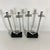 Vintage Modernist Steel Candelabra Holder Pair on an Ebonized Wood Bases For Sale In New York - Image 6 of 13