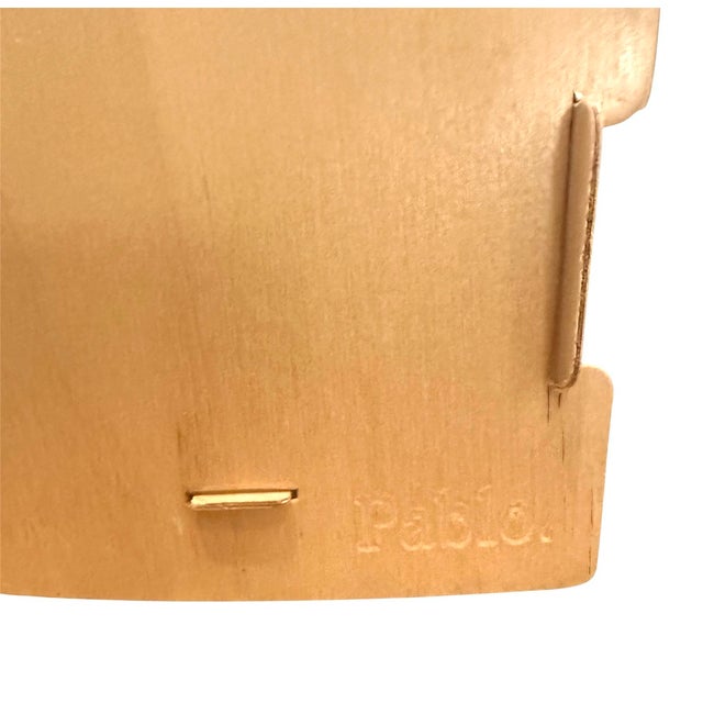 A striking, vintage bent wood "Uno" wastebasket/paper bin by Pablo Pardo. Features a simple and modern design with a mid-...
