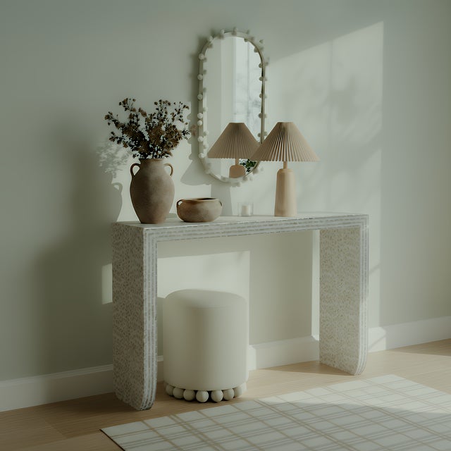 The Cyprus console table is a playful and artful statement for any space. Natural Capiz shells are carefully hand-placed...