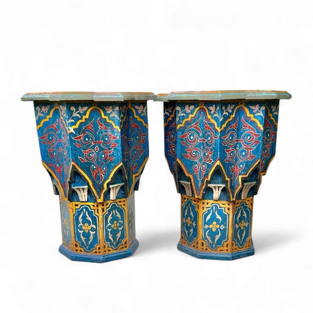 A vibrant and intricately constructed pair of vintage painted wood Moorish accent tables with star-shaped top over a...