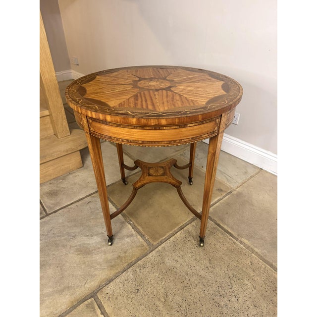 Pretty quality antique Edwardian inlaid satinwood circular occasional table, having a quality antique Edwardian occasional...