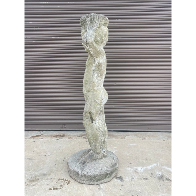 Description: A magnificent focal point with a story to tell, this large-scale cast stone statue of Hebe, the Greek Goddess...