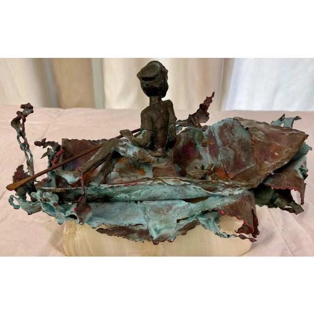Figurative 1970s Boy in Boat Metal Sculpture Marked "C Jere" For Sale - Image 3 of 12