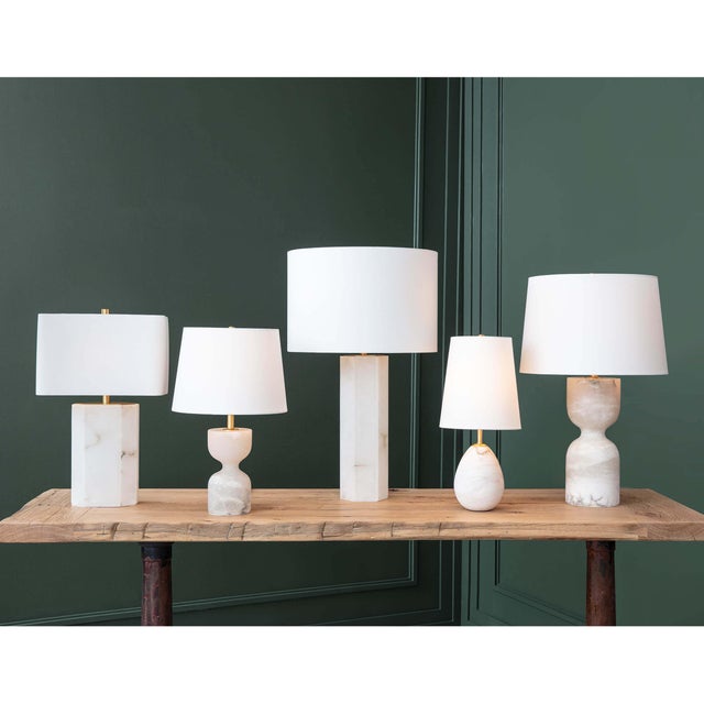 With it's clean and architectural lines, the Stella Alabaster Lamp defines sophistication. The simple but stately column...