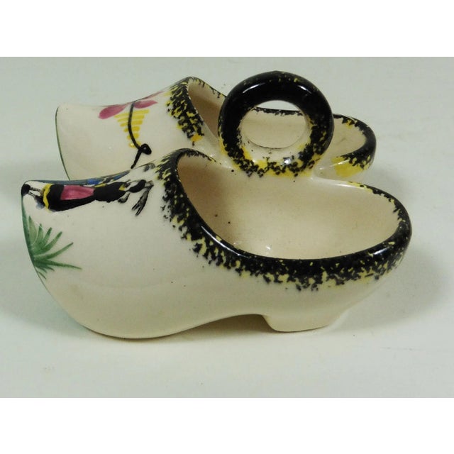 French Faience Quimper clogs saltcellar. Signed "Henriot Quimper."