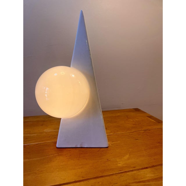 Vintage Pyramid Lamp in Ceramic and Glass Globe from Massive Lighting, 1980s, in Good conditions. Designed 1980 to 1989...