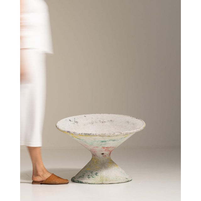 Painted pedestal bowl planter in Weathered Antique White. The weathered antique white surface highlights flared bowl form,...