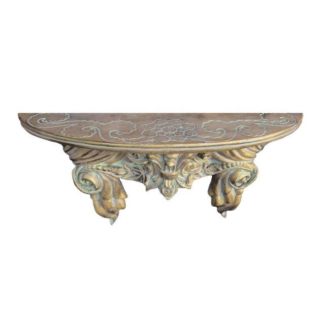 Vintage Rococo inspired faux wood shelf with gold and verdigris paint.