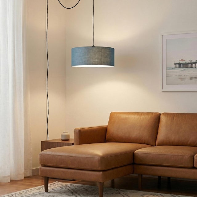 Designed by the NOVA Design Team in 2026, the Stretch Swag Lamp is a modern swag kit featuring a weathered brass finish...