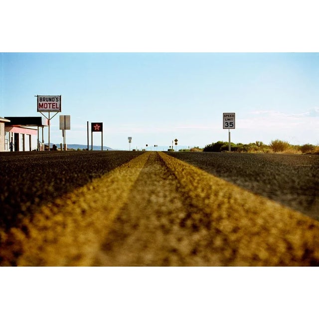 "Bruno's Motel, Gerlach" is an atmospheric C-Type print by Samuel Hicks. Hicks takes a low-down viewpoint for this...