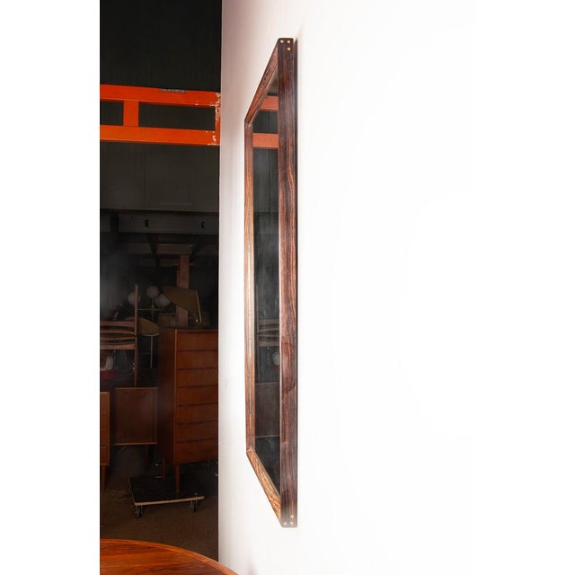 Large Danish Rosewood Mirror by Aksel Kjesgaard for Odder, 1960s, in Flawless conditions. Designed 1960 to 1969 This piece...