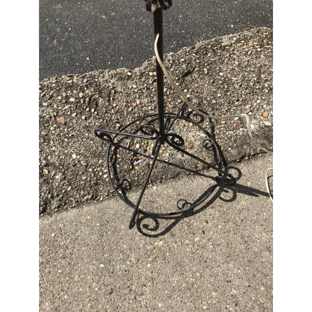 This beautiful Hungarian wrought iron floor lamp was made circa 1950. European Plug (up to 250V).The wiring of this item...
