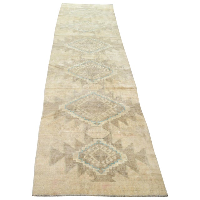 Hand-knotted with care using traditional rug making techniques, this wool rug blends timeless craftsmanship with a modern...