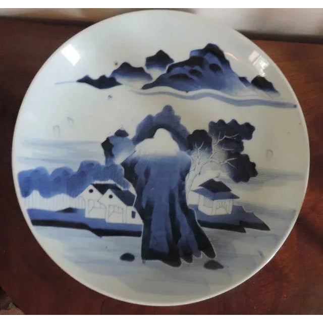 Antique 18th c. blue & white Chinese porcelain round charger platter. Decorated with a bright landscape scene. Kiln...