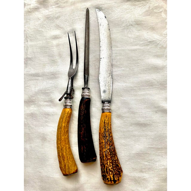 Antique 3-piece carbon steel carving set made by American manufacturer Landers, Frary & Clark, based in New Britain...