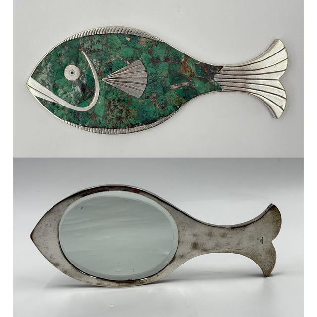 A rare and highly decorative hand mirror by celebrated Mexican designer and metalsmith Emilia Castillo, created in Taxco,...