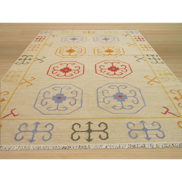 Harlow Kilim Ivory Nan Rug, Country of Origin: India. This exceptional flat-woven piece offers a sophisticated...