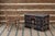 A charming English country folk art painted pine trunk or blanket chest, hand-decorated with a weathered architectural...