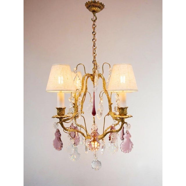 It works with 4 E14 type bulbs. European Plug (up to 250V).The wiring of this item may be original and might need...