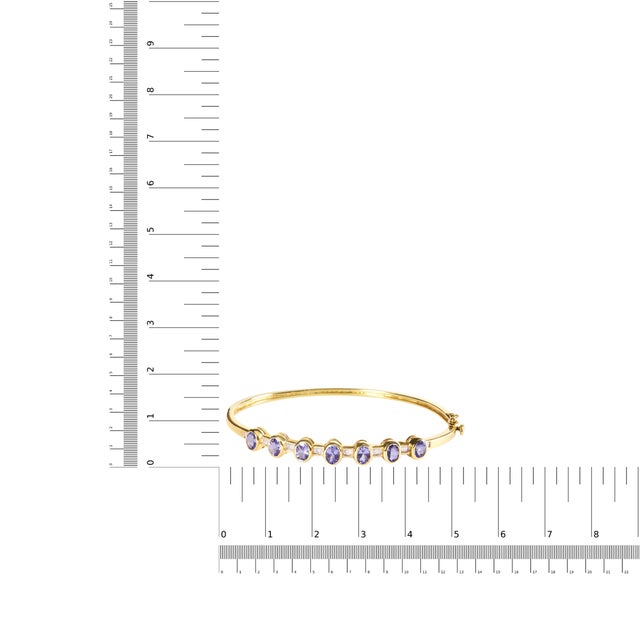 Early 21st Century 14K Yellow Gold Alternating Bezel Set 5MM Oval Shaped Tanzanite and 1/5 Cttw Diamond Bangle Bracelet - Fit's wrists up to 7.25" For Sale - Image 5 of 5