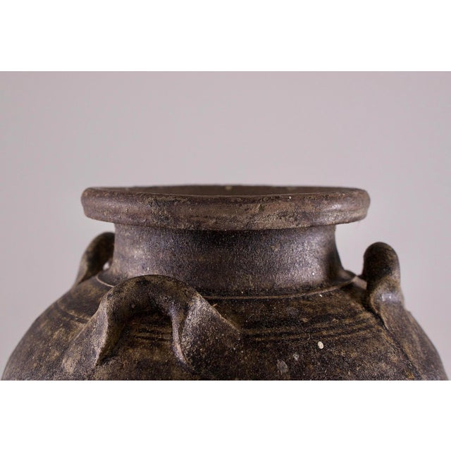Storage jar with 4 eyelet handles, in brownish glazed stoneware. Thailand, sawankhalok/si sachanalai kilns, 15th/16th...