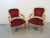 A pair or Louis XV style chairs with gold gilt painted finish, carved flower on crest, red velvet fabric with brass nail...