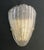 Italian wall light with a Murano glass shield hand blown in Graniglia technique to produce granular textured / Made in...