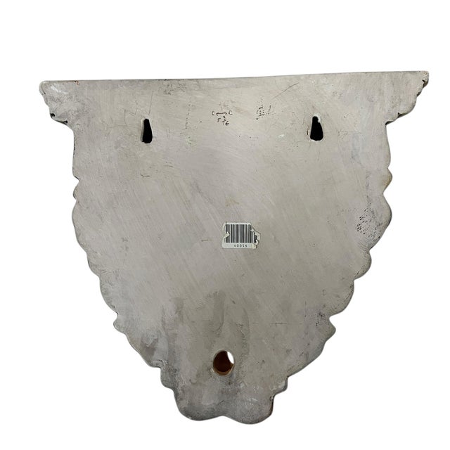 Vintage terra cotta acanthus leaf decorative wall bracket display shelf with plate grove. The taupe color has a dark...