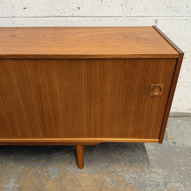 Wood Long Danish Modern Teak Low Sideboard With Sliding Doors, Circa 1960s For Sale - Image 7 of 8