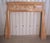 A large decorative victorian pine fireplace. The Fireplace has a large Break Front mantle piece with dentil moulding...