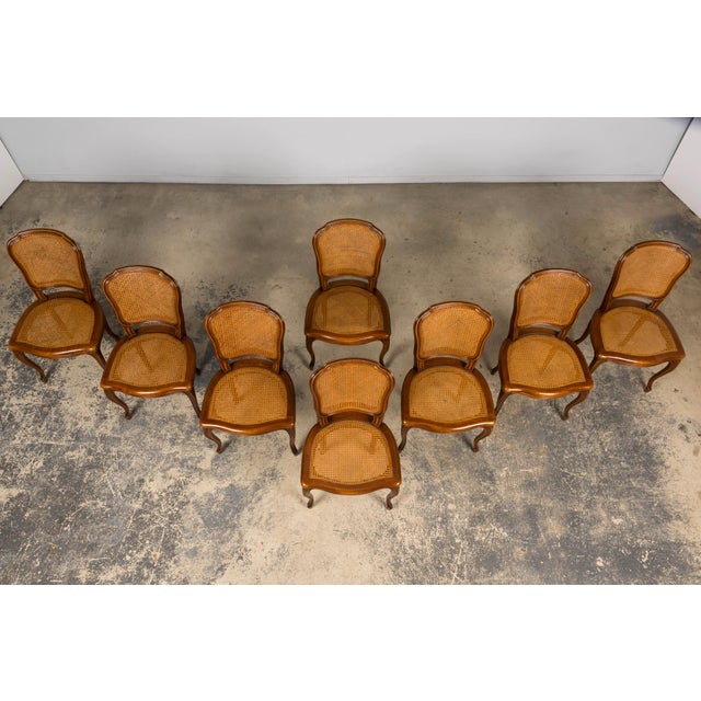 French Provincial Set of 8 Early 20th Century French Louis XV Style Walnut Cane Dining Chairs For Sale - Image 3 of 18