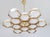 Italian modern chandelier with glossy white Murano glass globes, mounted on solid brass frame in unlacquered natural brass...