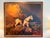 Mark Maggiori XXL “Electric Desert” Subject: A lone cowboy riding a white horse through a desert landscape beneath a...