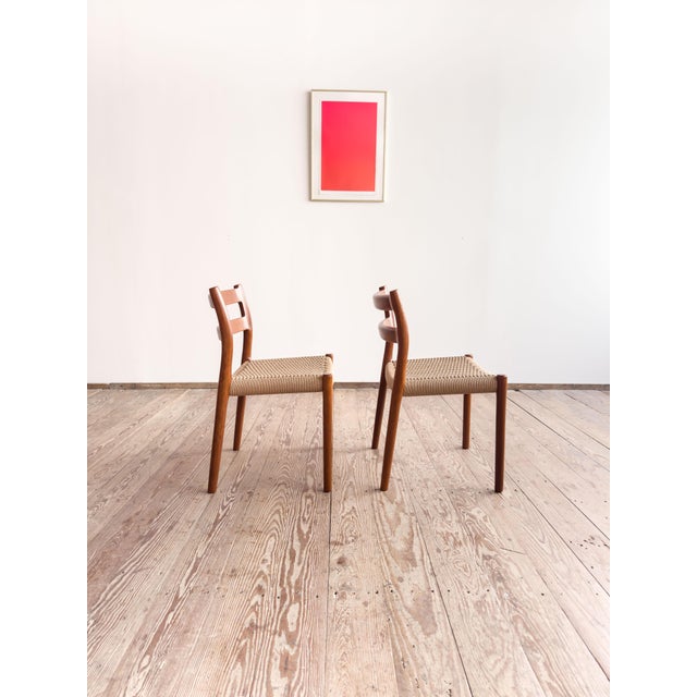 Dimensions: approx. 50 × 50 × 78 × 44 cm (width × depth × height × seat height) original set of two dining chairs designed...