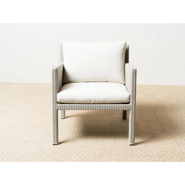 Outdoor lounge chair with Silk Grey hand-woven vertex fiber. Powder coated aluminum frame. Premium fill weather resistant...