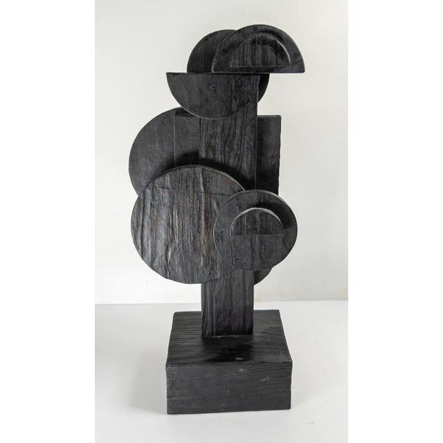 We are selling this great Mid-Century abstract sculpture. This sculpture features cut geometric pieces of plywood in an...