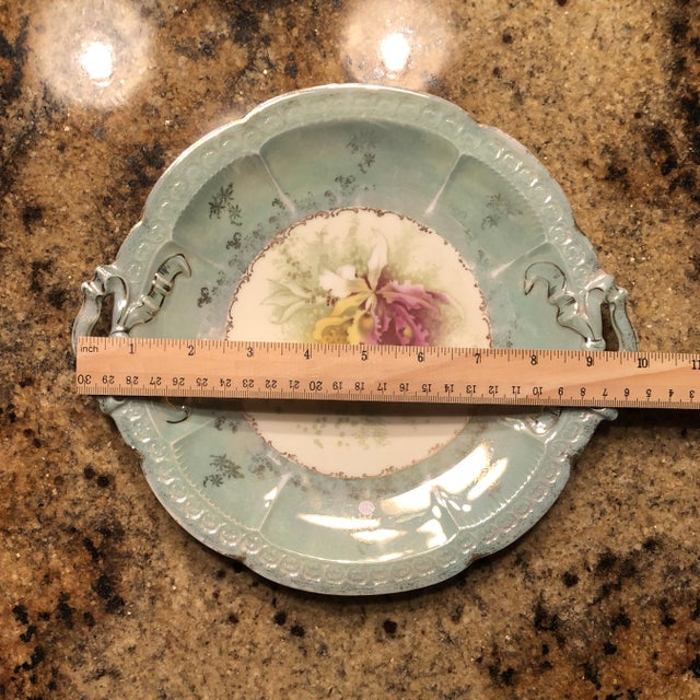 A stunning Edwardian era antique porcelain serving plate, featuring a soft seafoam/aqua celadon wash with delicate gold...