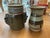 Elevate your shelves or tabletop with this stunning pair of mid-century studio pottery vessels. Both pieces feature rich,...