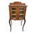 This elegant 19th-century French curio cabinet is crafted from rich walnut and features delicate cabriole legs, glass-...