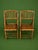 A charming pair of vintage 1950s bamboo folding chairs featuring slender vertical spindle backs, woven/slatted seats and...