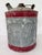 This vintage galvanized metal oil can dates from the 1930s–1940s and showcases classic early-industrial American design....