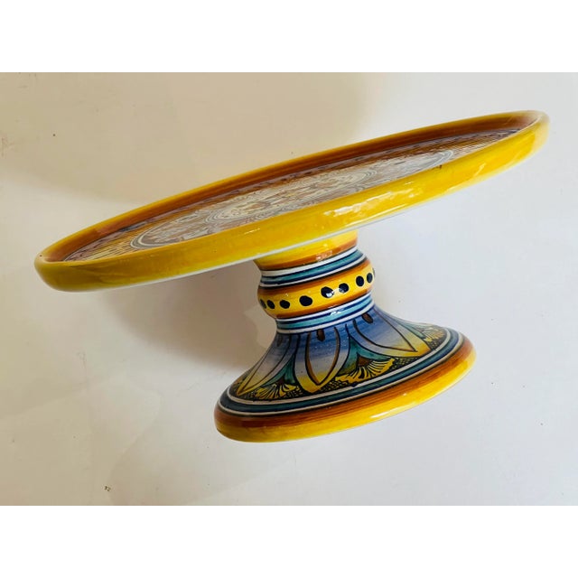 Vintage Deruta pedestal dishBeautifully colored and intricately designed. Signed by the artist on the bottom.