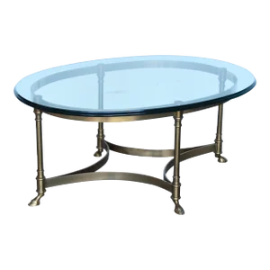 1970s Hollywood Regency Brass and Glass CoffeeTable With Hooved Feet